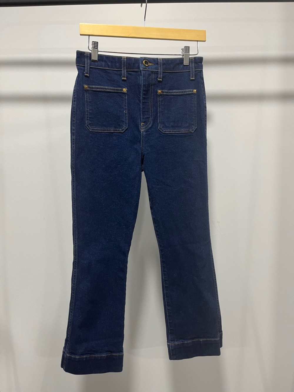 KHAITE Dark Navy High-Rise lightly flared, croppedJeans with Front Patch Pockets
